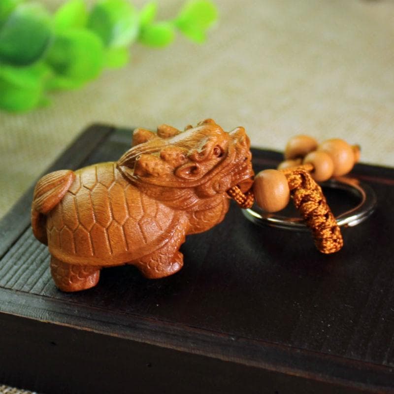 桃の木 龍亀ロングイ 根付キーホルダー - メルカリ